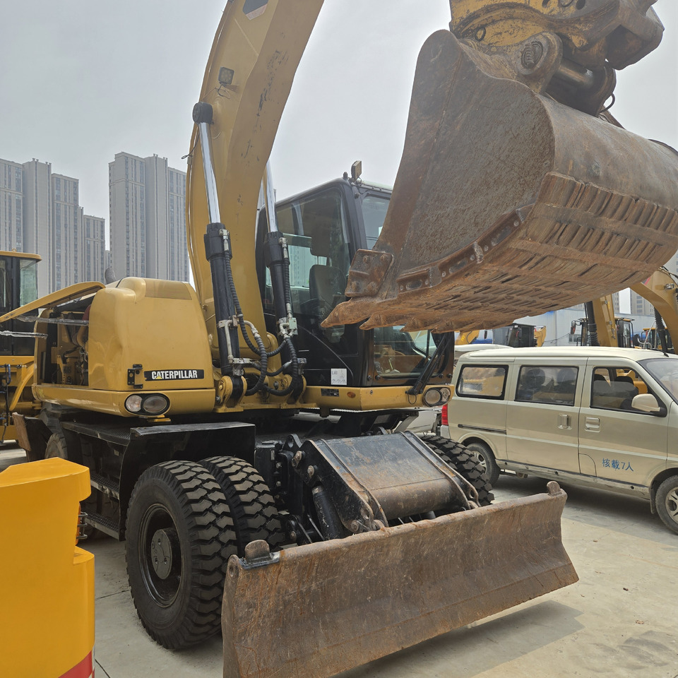 CAT M320D2 - Ekskavator me goma: foto 3 CAT M320D2 - Ekskavator me goma: foto 3