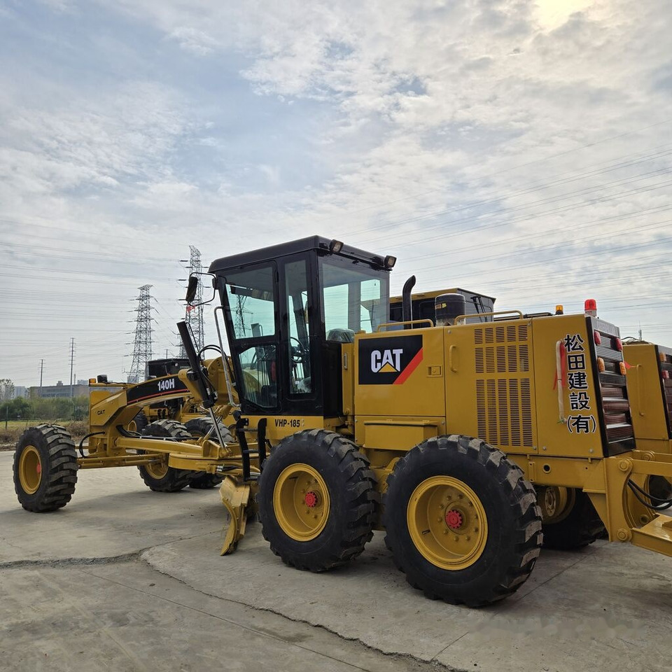 Caterpillar 140H - Makinë niveluese: foto 3 Caterpillar 140H - Makinë niveluese: foto 3