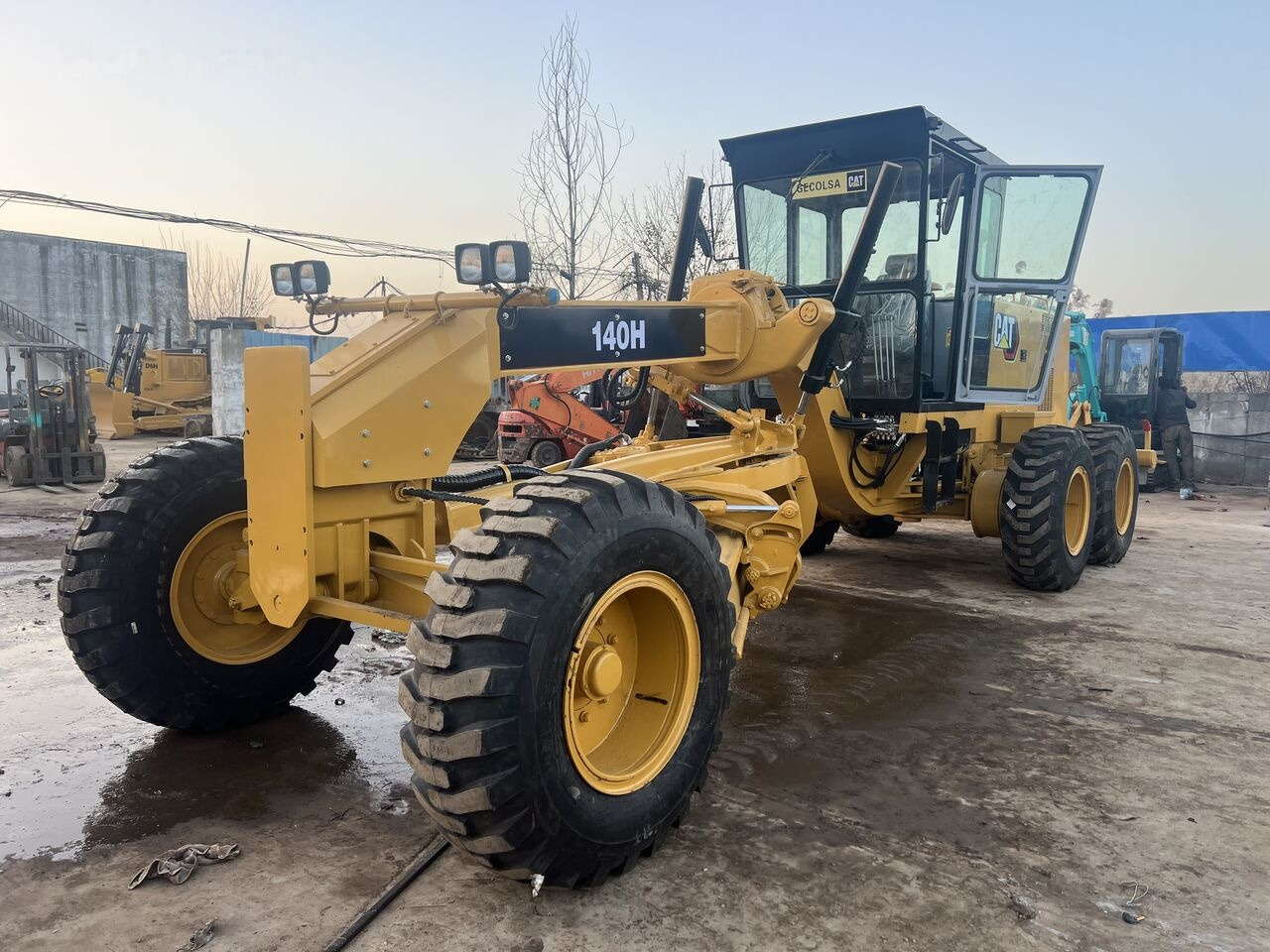 Caterpillar 140H - Makinë niveluese: foto 1 Caterpillar 140H - Makinë niveluese: foto 1