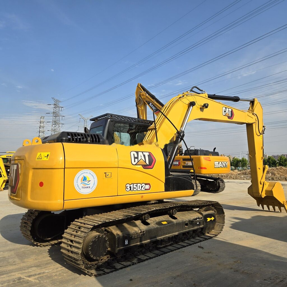 Caterpillar 315D2 - Ekskavator me zinxhirë: foto 1 Caterpillar 315D2 - Ekskavator me zinxhirë: foto 1