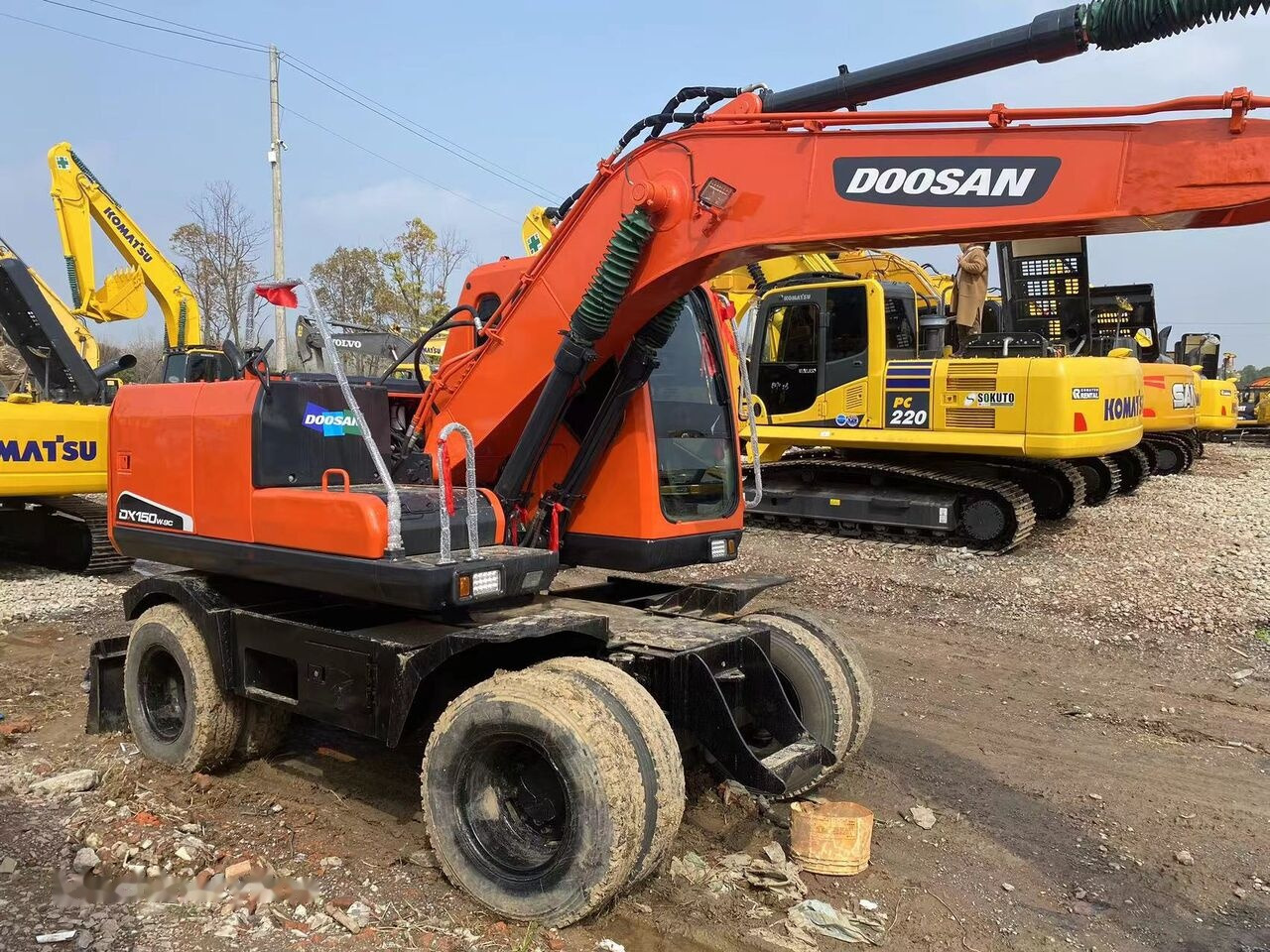 Ekskavator me goma Doosan DX150W: foto 13