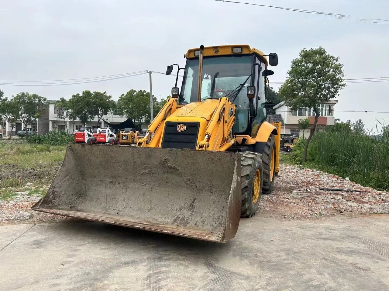 Fadromë me shkarkim nga prapa JCB 3CX: foto 10