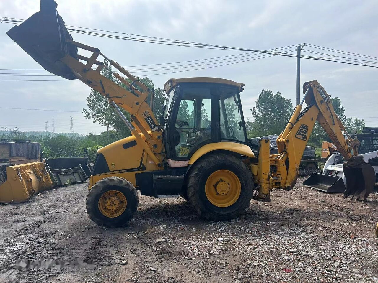 Fadromë me shkarkim nga prapa JCB 3CX: foto 13