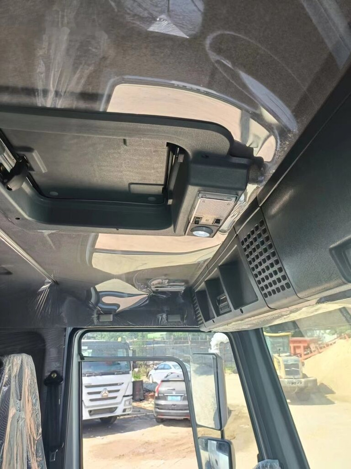 Sinotruk Howo - Kamion vetëshkarkues: foto 4 Sinotruk Howo - Kamion vetëshkarkues: foto 4