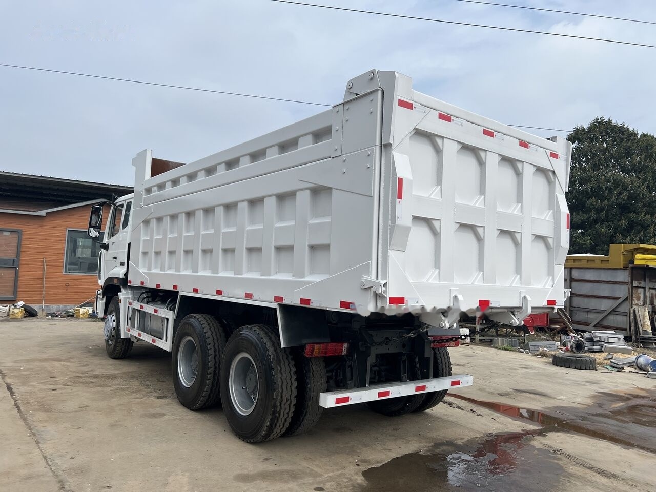 Sinotruk Howo - Kamion vetëshkarkues: foto 2 Sinotruk Howo - Kamion vetëshkarkues: foto 2