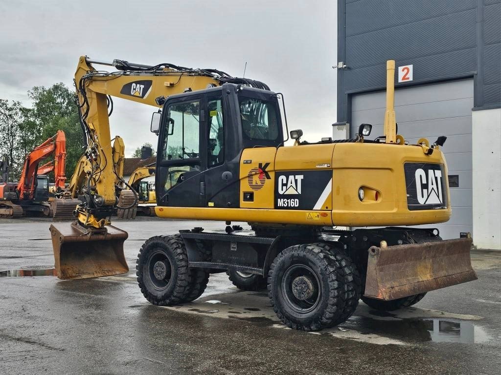 CAT M 316 D - Ekskavator me goma: foto 3 CAT M 316 D - Ekskavator me goma: foto 3