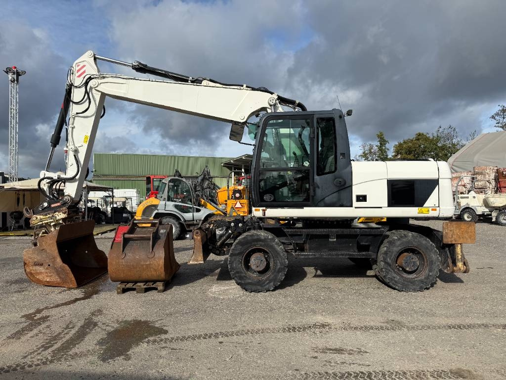 CAT M 316 D - Ekskavator me goma: foto 1 CAT M 316 D - Ekskavator me goma: foto 1