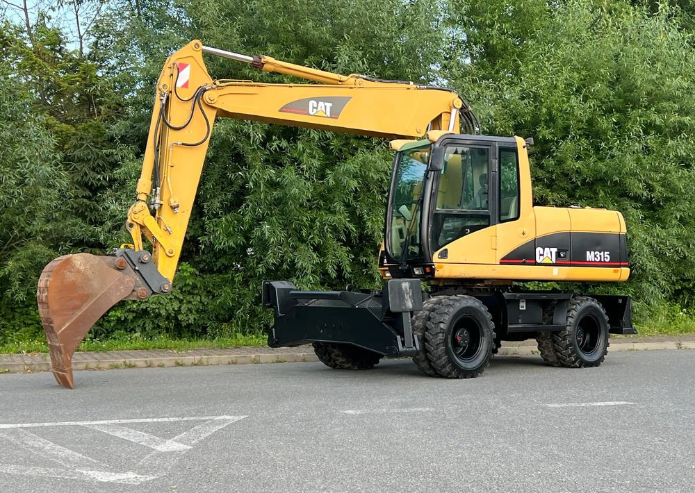 Caterpillar CAT M315C CATERPILLAR SPROWADZONY Bardzo Dobry Stan - Ekskavator me goma: foto 1 Caterpillar CAT M315C CATERPILLAR SPROWADZONY Bardzo Dobry Stan - Ekskavator me goma: foto 1
