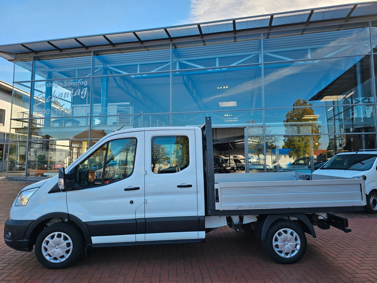 Ford Transit Pritsche 310 DoKa AHK Klima 7 Sitzer - Kamioncine me karroceri, Kamioncine dopio kabinë: foto 2 Ford Transit Pritsche 310 DoKa AHK Klima 7 Sitzer - Kamioncine me karroceri, Kamioncine dopio kabinë: foto 2