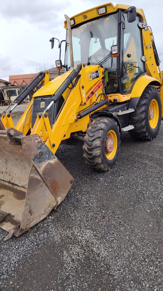 JCB 3CX - Fadromë me shkarkim nga prapa: foto 5 JCB 3CX - Fadromë me shkarkim nga prapa: foto 5