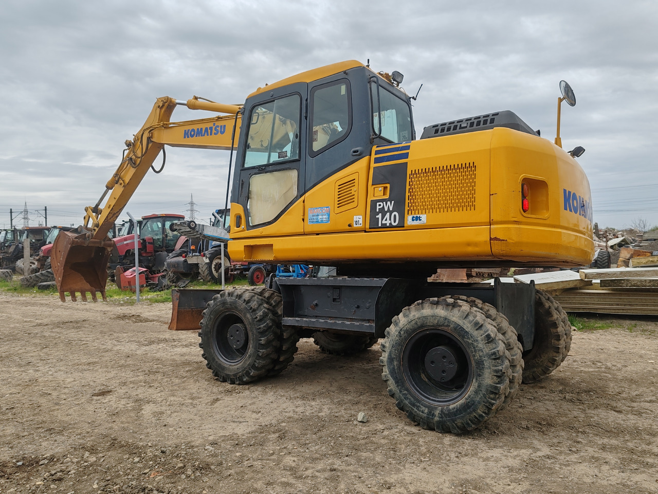 Komatsu PW140-7 - Ekskavator me goma: foto 5 Komatsu PW140-7 - Ekskavator me goma: foto 5