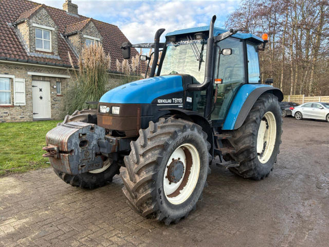 New Holland TS115 - Makineri ndërtimi: foto 1 New Holland TS115 - Makineri ndërtimi: foto 1