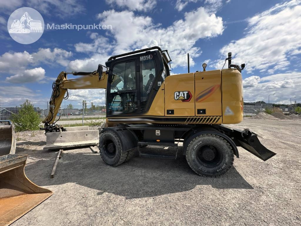 CAT M 314 - Ekskavator me goma: foto 1 CAT M 314 - Ekskavator me goma: foto 1