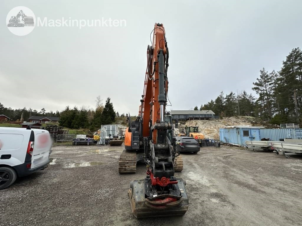 Doosan DX 140 LCR-5 - Ekskavator me zinxhirë: foto 3 Doosan DX 140 LCR-5 - Ekskavator me zinxhirë: foto 3