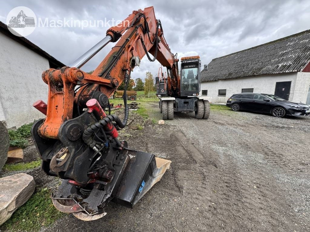 Hitachi ZX 140 W-3 - Ekskavator me goma: foto 5 Hitachi ZX 140 W-3 - Ekskavator me goma: foto 5
