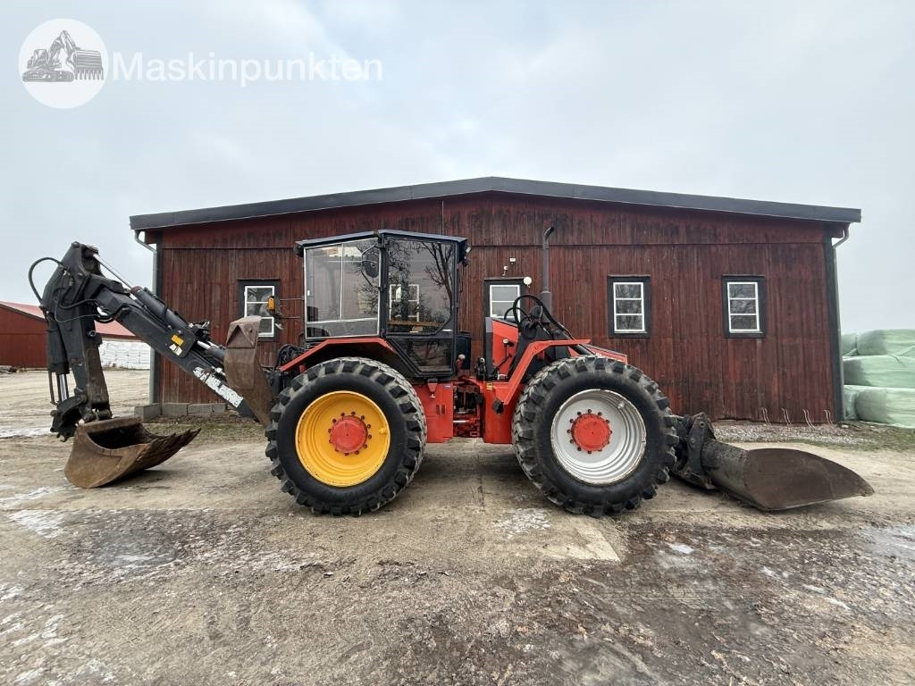 Huddig 960 - Fadromë me shkarkim nga prapa: foto 4 Huddig 960 - Fadromë me shkarkim nga prapa: foto 4