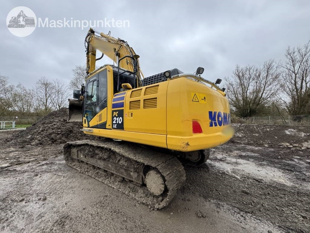 Komatsu PC 210 LC-11E0 - Ekskavator me zinxhirë: foto 2 Komatsu PC 210 LC-11E0 - Ekskavator me zinxhirë: foto 2