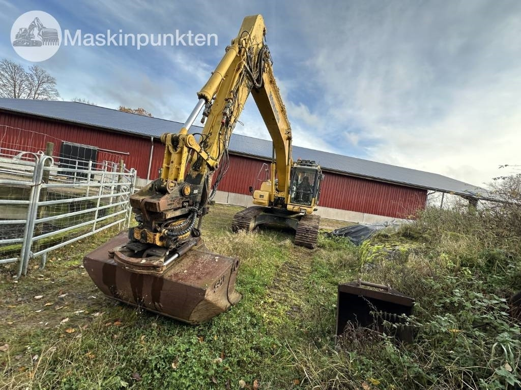 Komatsu PC 210 LC-8 - Ekskavator me zinxhirë: foto 2 Komatsu PC 210 LC-8 - Ekskavator me zinxhirë: foto 2