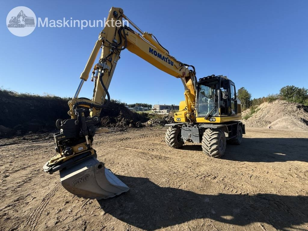 Komatsu PW 160 - Ekskavator me goma: foto 1 Komatsu PW 160 - Ekskavator me goma: foto 1