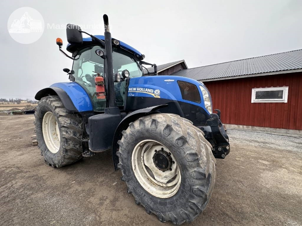 New Holland T 7.185 - Traktor: foto 1 New Holland T 7.185 - Traktor: foto 1