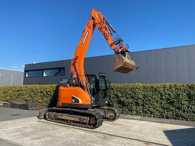 Doosan DX140LCR-5 - Ekskavator me zinxhirë: foto 5 Doosan DX140LCR-5 - Ekskavator me zinxhirë: foto 5