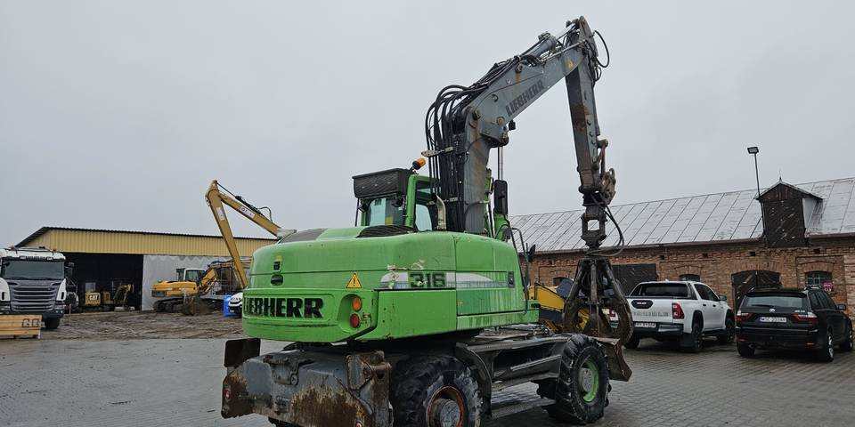 Koparka kołowa Liebherr A 316 Litronic chwytak podpory pług - Ekskavator me goma: foto 5 Koparka kołowa Liebherr A 316 Litronic chwytak podpory pług - Ekskavator me goma: foto 5