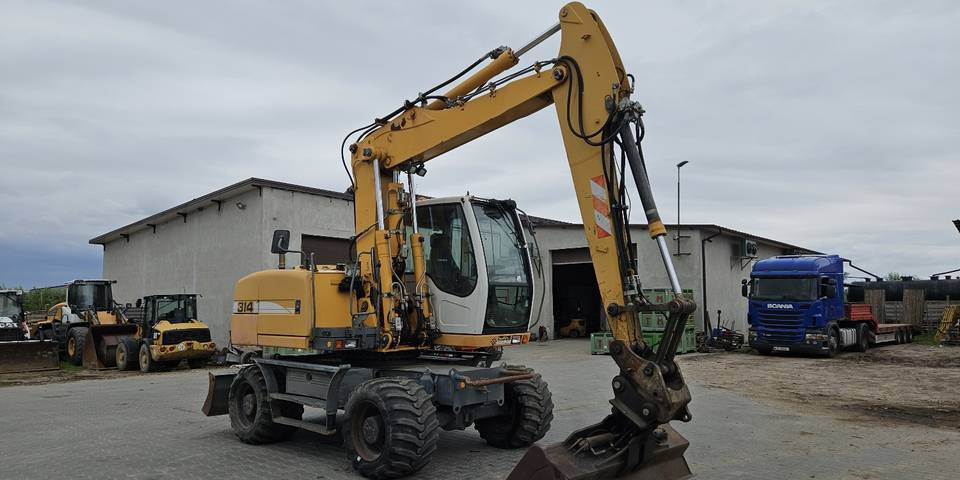 Koparka kołowa Liebherr A314 Litronic 9350 h+ 5 łyżek kołówka - Ekskavator me goma: foto 4 Koparka kołowa Liebherr A314 Litronic 9350 h+ 5 łyżek kołówka - Ekskavator me goma: foto 4