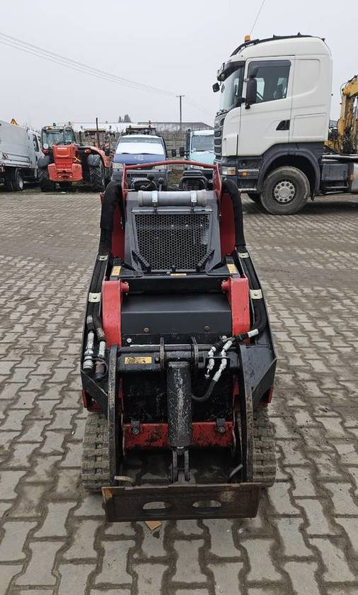 Miniładowarka Toro Dingo TX1000 bobcat ditch witch - Fadromë me shkarkim nga prapa: foto 3 Miniładowarka Toro Dingo TX1000 bobcat ditch witch - Fadromë me shkarkim nga prapa: foto 3