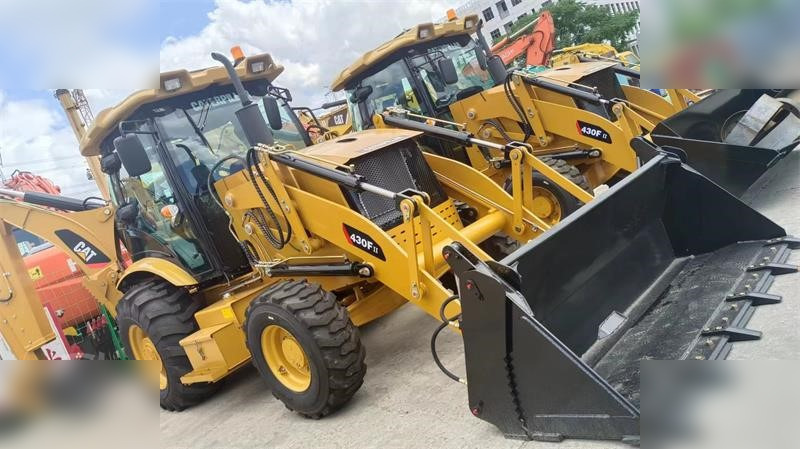 CATERPILLAR 430F - Fadromë me shkarkim nga prapa: foto 1 CATERPILLAR 430F - Fadromë me shkarkim nga prapa: foto 1