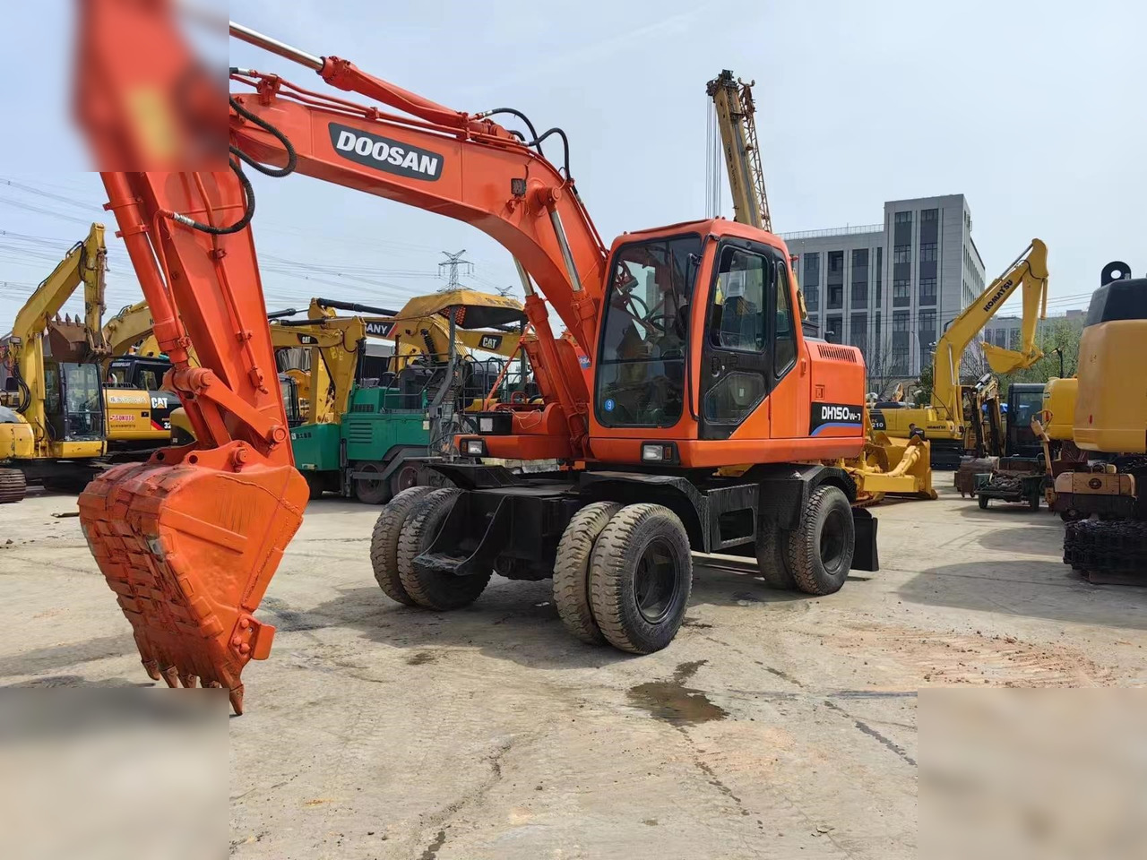 DOOSAN DH150W-7 - Ekskavator me goma: foto 2 DOOSAN DH150W-7 - Ekskavator me goma: foto 2