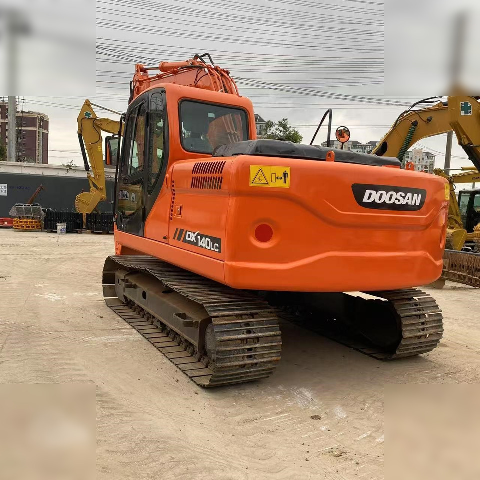 DOOSAN DX140 LC - Ekskavator me zinxhirë: foto 2 DOOSAN DX140 LC - Ekskavator me zinxhirë: foto 2