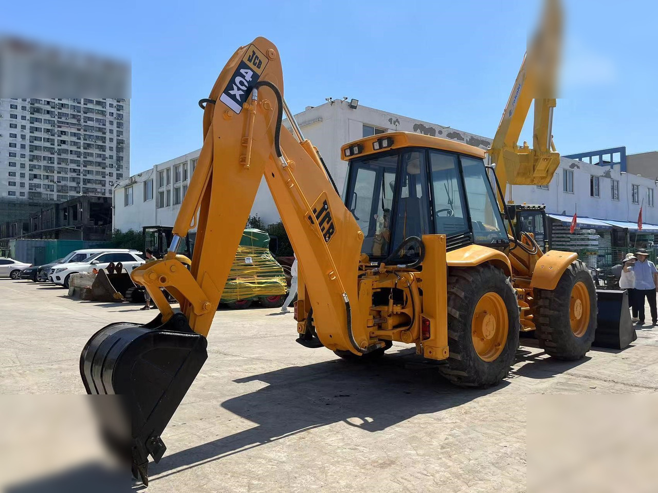 JCB 4CX - Fadromë me shkarkim nga prapa: foto 4 JCB 4CX - Fadromë me shkarkim nga prapa: foto 4
