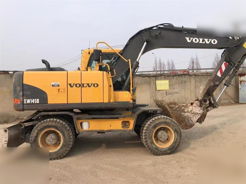 VOLVO EW145B - Ekskavator me goma: foto 1 VOLVO EW145B - Ekskavator me goma: foto 1