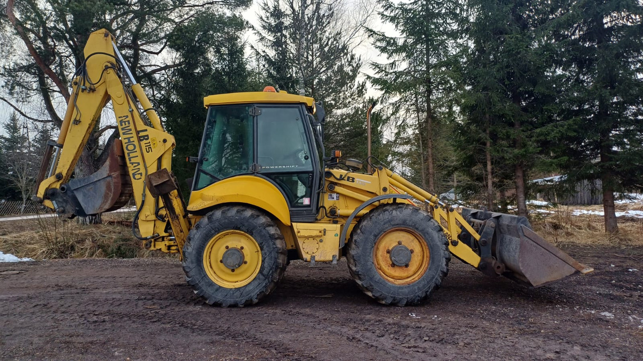 New Holland LB115-4PS - Fadromë me shkarkim nga prapa: foto 5 New Holland LB115-4PS - Fadromë me shkarkim nga prapa: foto 5