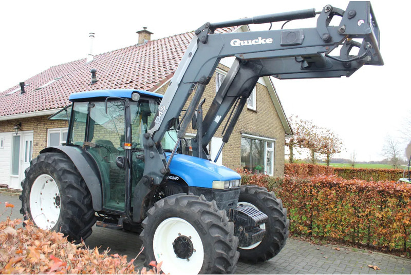 New Holland TN75S - Traktor: foto 1 New Holland TN75S - Traktor: foto 1