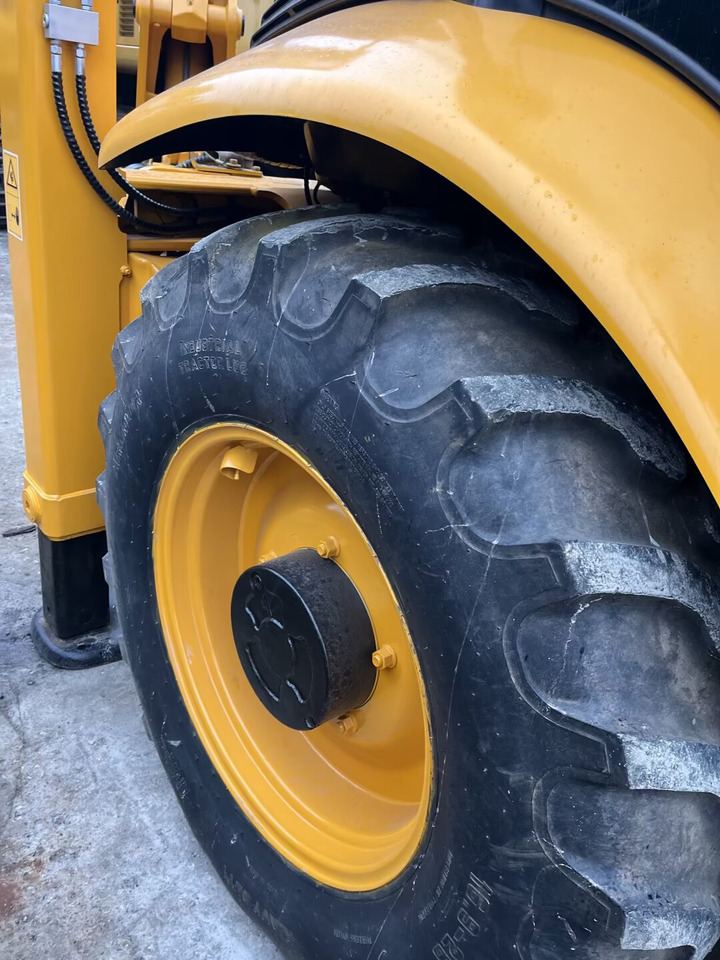 JCB - Fadromë me shkarkim nga prapa: foto 5 JCB - Fadromë me shkarkim nga prapa: foto 5