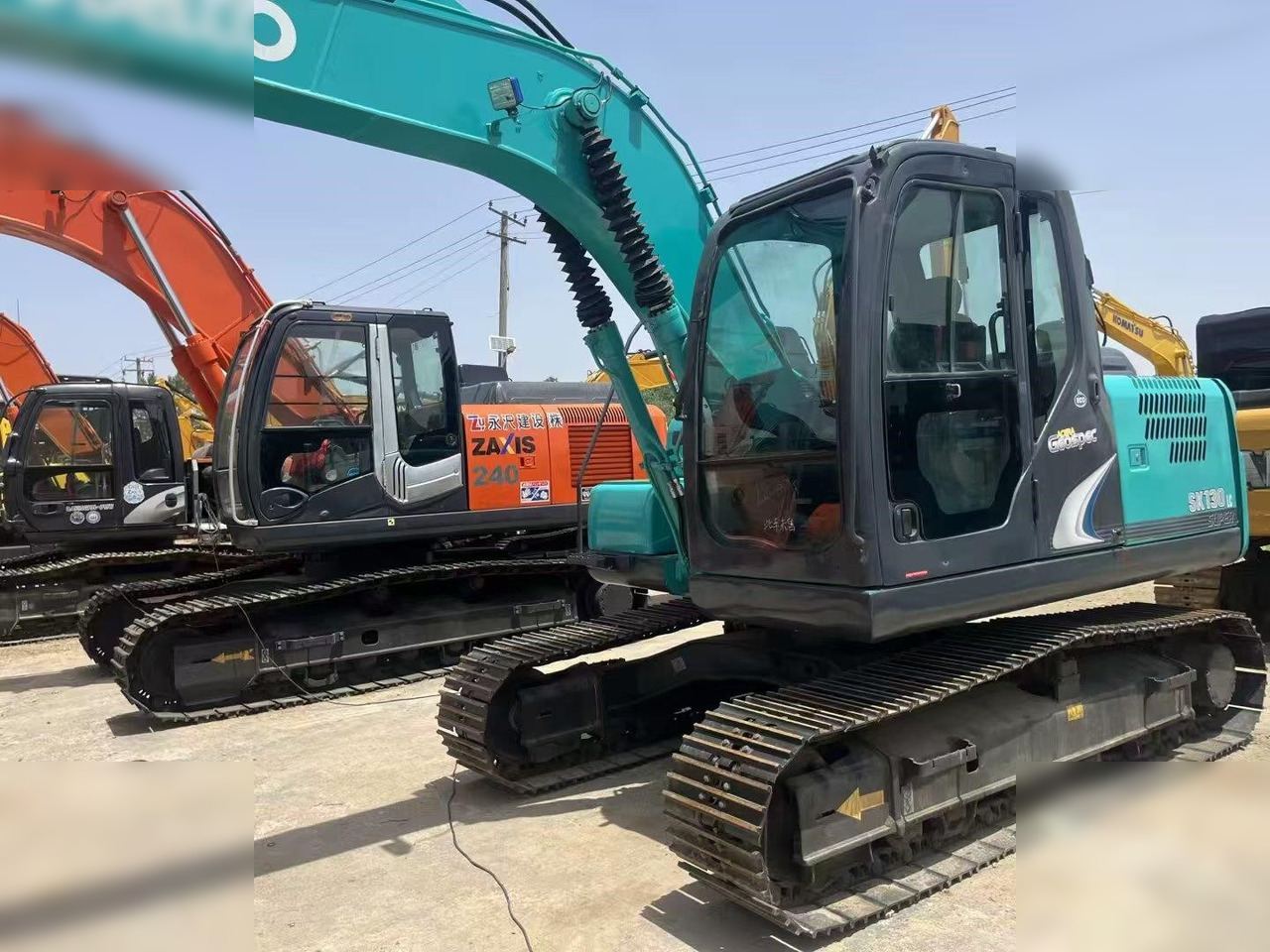KOBELCO SK130 LC - Ekskavator me zinxhirë: foto 2 KOBELCO SK130 LC - Ekskavator me zinxhirë: foto 2