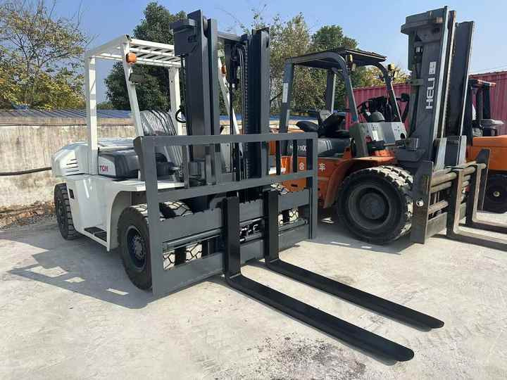 High Quality TCM 7 Ton with Hydraulic Distance Adjustment Used Forklift in Stock Used tcm Forklift 7 Ton Used tcm Fd70 Forklift - Pirun ngritës: foto 3 High Quality TCM 7 Ton with Hydraulic Distance Adjustment Used Forklift in Stock Used tcm Forklift 7 Ton Used tcm Fd70 Forklift - Pirun ngritës: foto 3