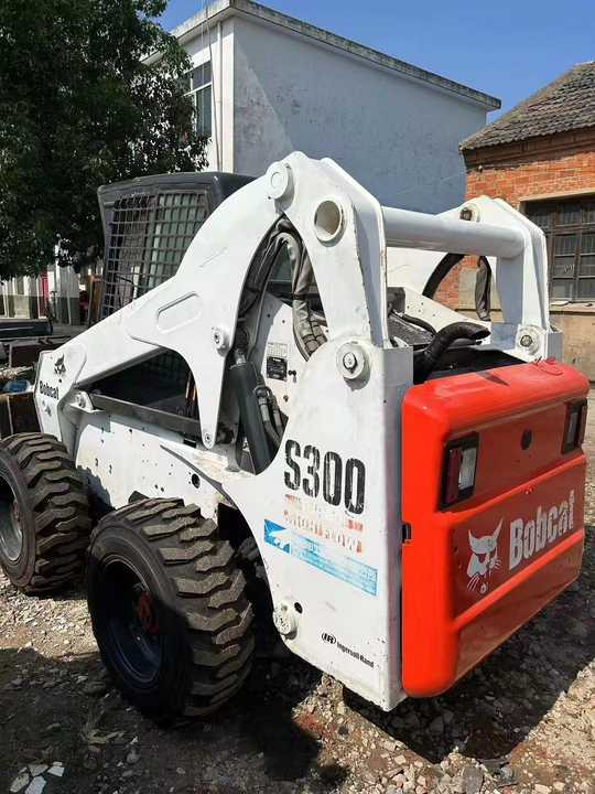Used Bob Cat Bob Cat S300 Used Skid Steer Wheel Loader Multifunctional Track Loaders Bobcat - Mini fadrom: foto 4 Used Bob Cat Bob Cat S300 Used Skid Steer Wheel Loader Multifunctional Track Loaders Bobcat - Mini fadrom: foto 4