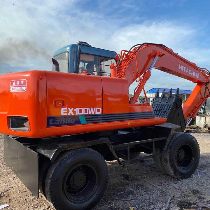 Used Hitachi Ex100WD Wheel Excavator for Sale Japan Made Hitachi Ex100wd Wheeled Excavator for Sale - Ekskavator me zinxhirë: foto 1 Used Hitachi Ex100WD Wheel Excavator for Sale Japan Made Hitachi Ex100wd Wheeled Excavator for Sale - Ekskavator me zinxhirë: foto 1