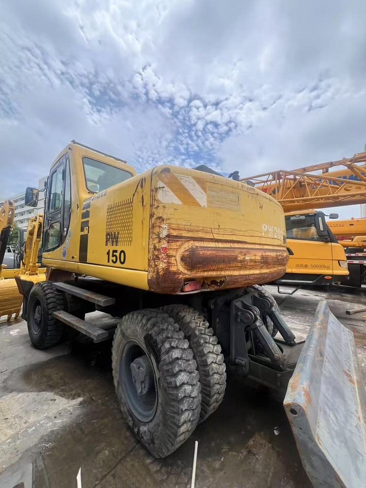 KOMATSU PW150 - Ekskavator me goma: foto 1 KOMATSU PW150 - Ekskavator me goma: foto 1