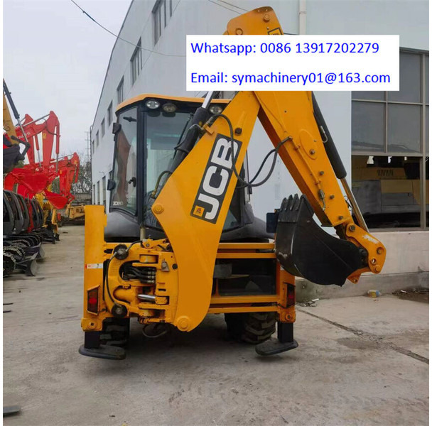 JCB 3CX - Fadromë me shkarkim nga prapa: foto 1 JCB 3CX - Fadromë me shkarkim nga prapa: foto 1