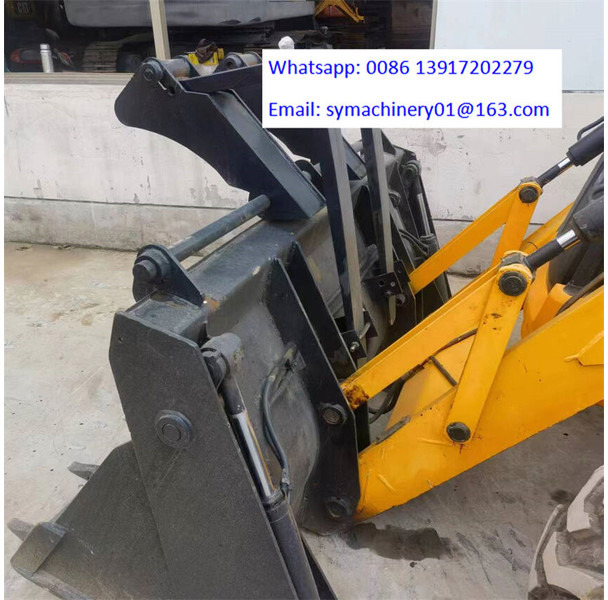 JCB 3CX - Fadromë me shkarkim nga prapa: foto 5 JCB 3CX - Fadromë me shkarkim nga prapa: foto 5