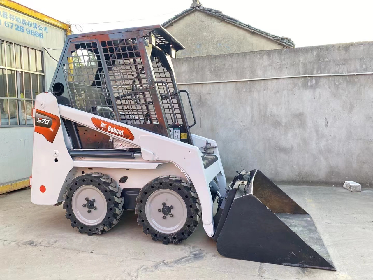 BOBCAT S70 Skid Steer Loader Click for Discount - Mini fadrom: foto 2 BOBCAT S70 Skid Steer Loader Click for Discount - Mini fadrom: foto 2