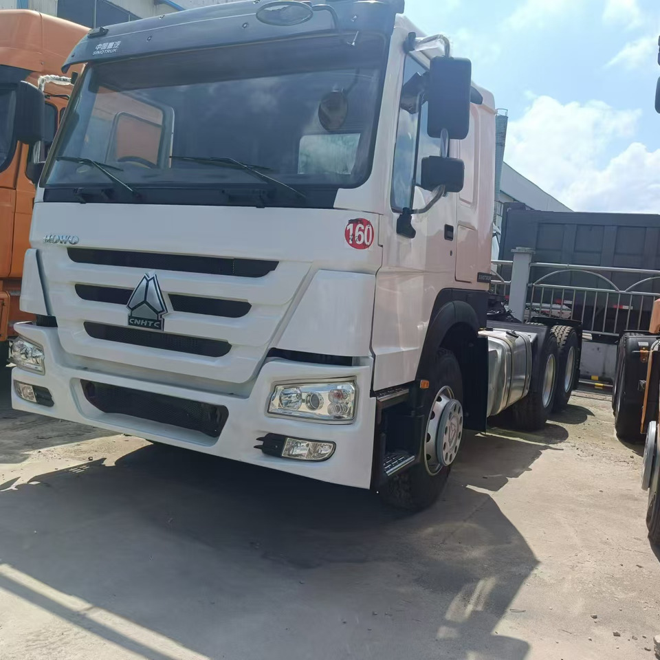 SINOTRUK HOWO Tractor Unit Right-hand Click for discount - Gjysmë-kamion: foto 2 SINOTRUK HOWO Tractor Unit Right-hand Click for discount - Gjysmë-kamion: foto 2