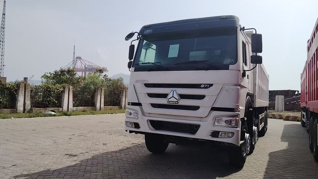 SINOTRUK HOWO 371 8x4 Dump Truck Click for Discount - Kamion vetëshkarkues: foto 1 SINOTRUK HOWO 371 8x4 Dump Truck Click for Discount - Kamion vetëshkarkues: foto 1
