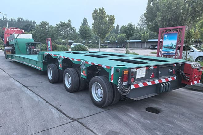 TITAN 20m Extendable Semi Trailer for sale in Nigeria - Gjysmë rimorkio me plan ngarkimi të ulët: foto 1 TITAN 20m Extendable Semi Trailer for sale in Nigeria - Gjysmë rimorkio me plan ngarkimi të ulët: foto 1