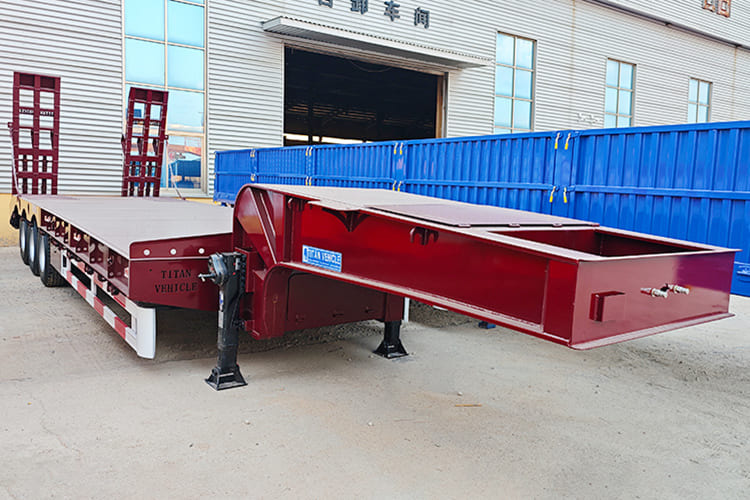 TITAN 3 Axle Low Bed Trailer for Sale in Saudi Arabia - Gjysmë rimorkio me plan ngarkimi të ulët: foto 1 TITAN 3 Axle Low Bed Trailer for Sale in Saudi Arabia - Gjysmë rimorkio me plan ngarkimi të ulët: foto 1