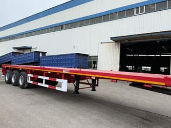 TITAN Flatbed Tri Axle Truck Trailer for Sale in Tanzania - Gjysmë rimorkio e hapur/ Platformë: foto 4 TITAN Flatbed Tri Axle Truck Trailer for Sale in Tanzania - Gjysmë rimorkio e hapur/ Platformë: foto 4