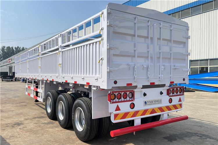 TITAN Tri Axle 60 Ton Fence Cargo Semi Trailer for Sale In Guinea - Gjysmë rimorkio bagëtish: foto 5 TITAN Tri Axle 60 Ton Fence Cargo Semi Trailer for Sale In Guinea - Gjysmë rimorkio bagëtish: foto 5